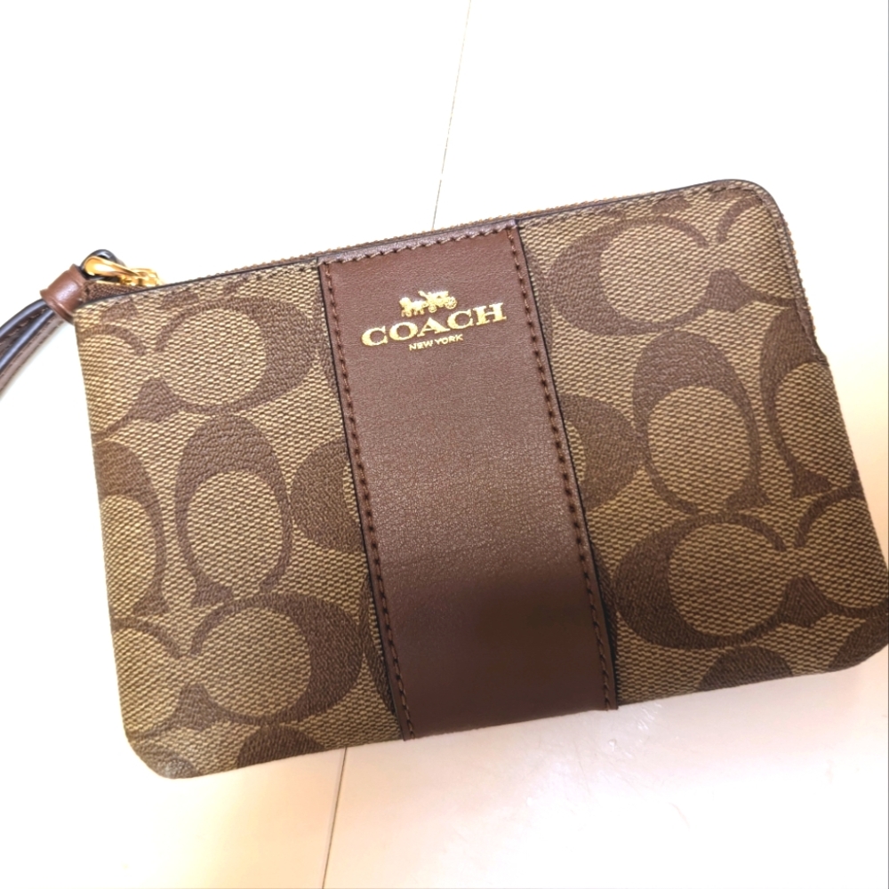 Brand new COACH wristlet